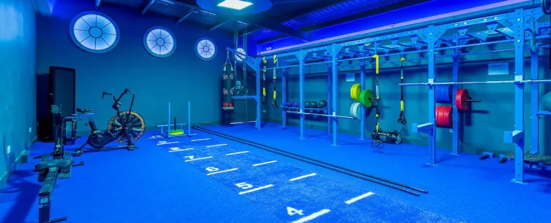 blue coloured weightlifting area at a gym